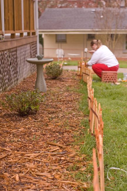 Julie installing the garden fence
Keywords: garden fence julie
