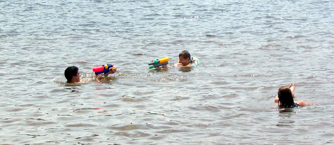 Emily James and Tim
waterfight at Lake Caroline
Keywords: Emily James Tim