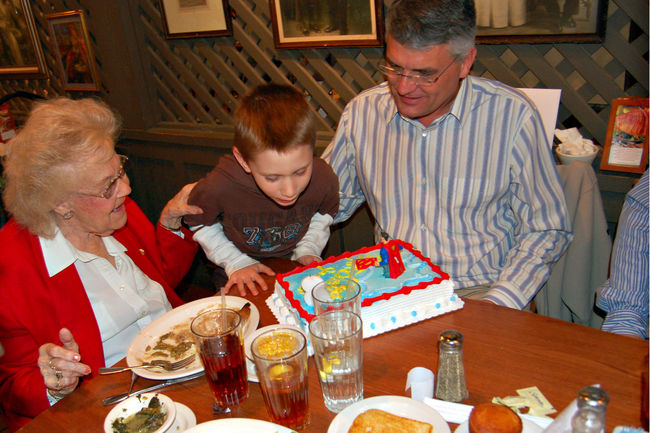 Mawmaw James and Dad
blowing out the birthday cake
James' birthday, Dec. 29, 2006

December 30, 2006
