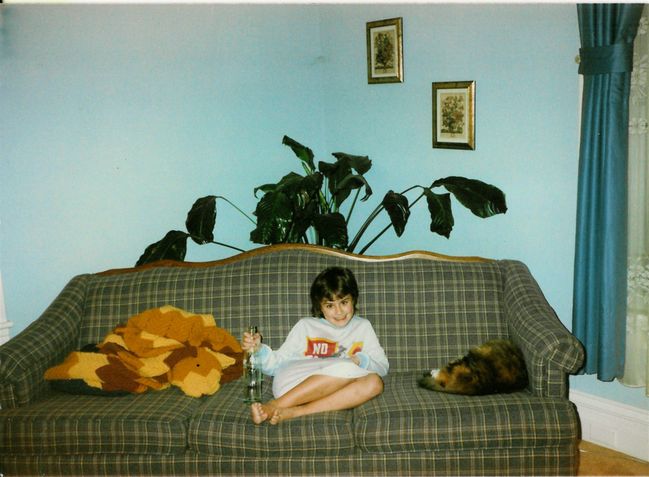 Emily on t he couch with Prissy
around 1988. Notice the large glass coke bottle.
Keywords: Emily