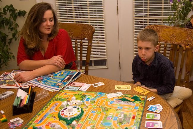 The game of life wasn't working out so well...
for James.  Auntie Em' watches. 
Thanksgiving 2007
Keywords: James Emily