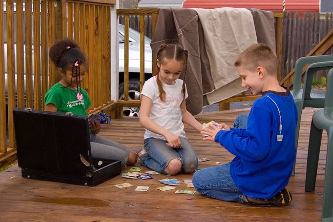 James and the neighbor girls trading pokemon cards
They love my old briefcase
Keywords: James Dana Jordan pokemon