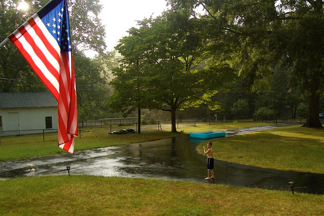James playing in the rainstorm
Keywords: James rain